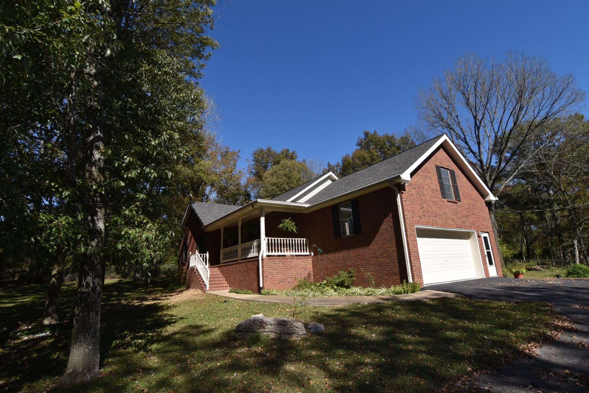 980 Harkreader Road Mount Juliet, TN 37122 - Photo 2 of 33 a front view of a house with a yard and garage