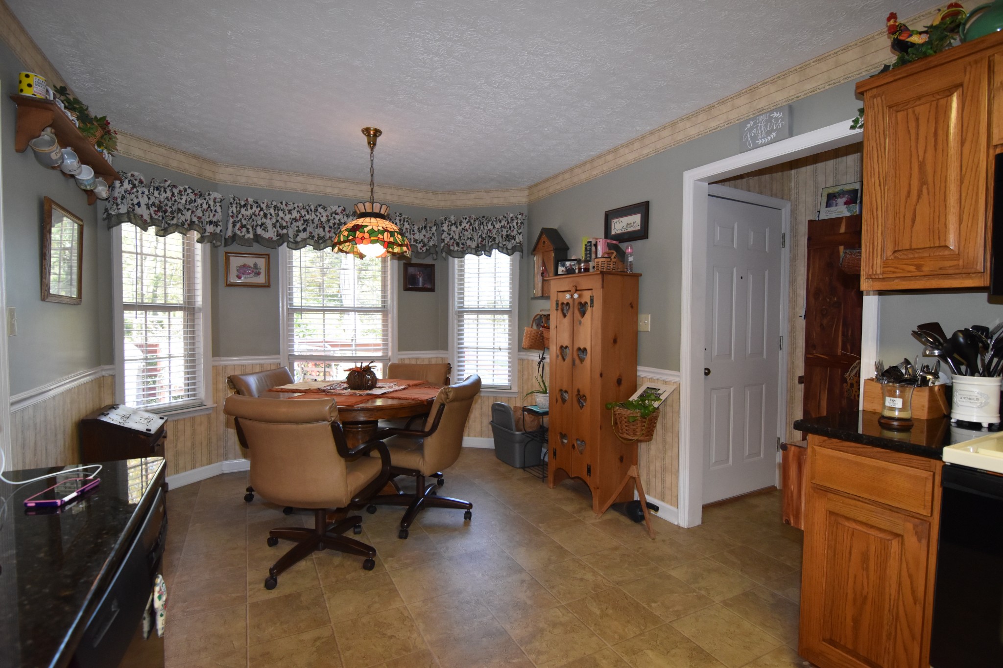 980 Harkreader Road Mount Juliet, TN 37122 - Photo 12 of 33 a view of a dining room with furniture window and outside view