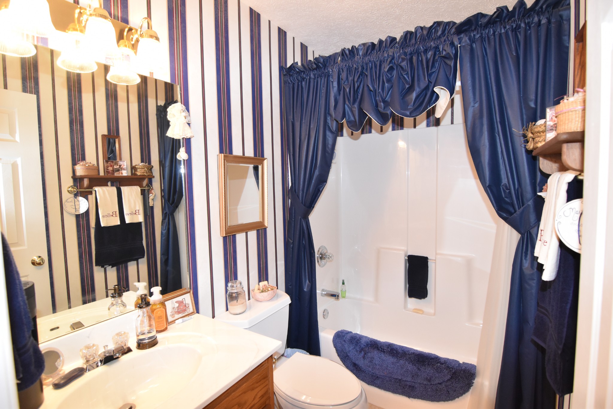 980 Harkreader Road Mount Juliet, TN 37122 - Photo 18 of 33 a bathroom with a sink and a mirror