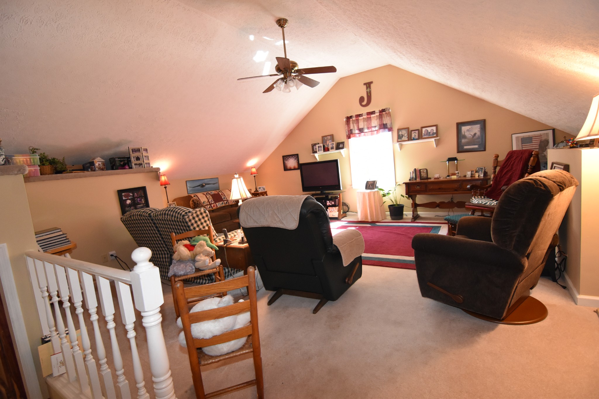 980 Harkreader Road Mount Juliet, TN 37122 - Photo 22 of 33 a living room with furniture and a floor to ceiling window