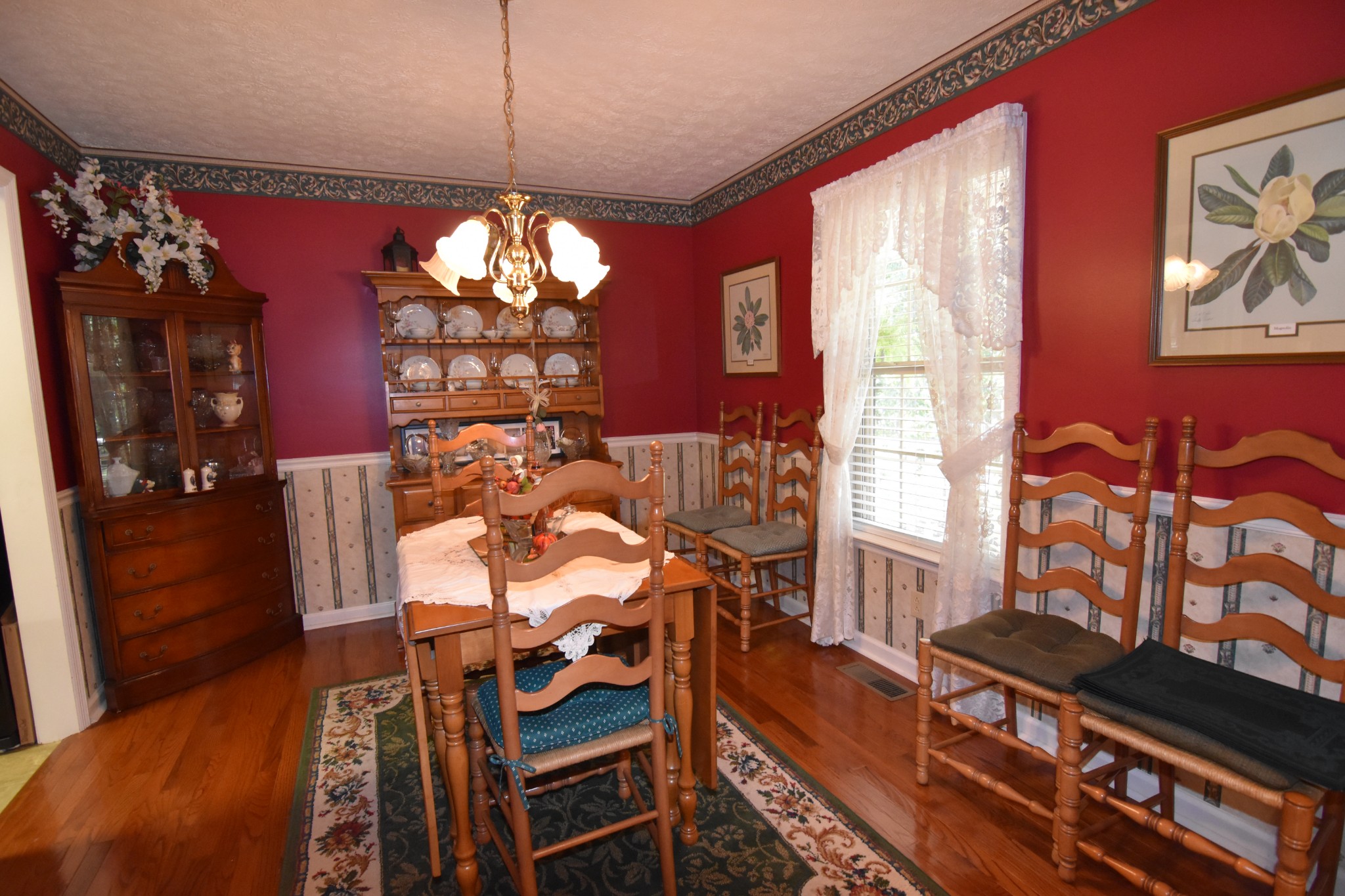 980 Harkreader Road Mount Juliet, TN 37122 - Photo 9 of 33 a view of a dining room with furniture and chandelier