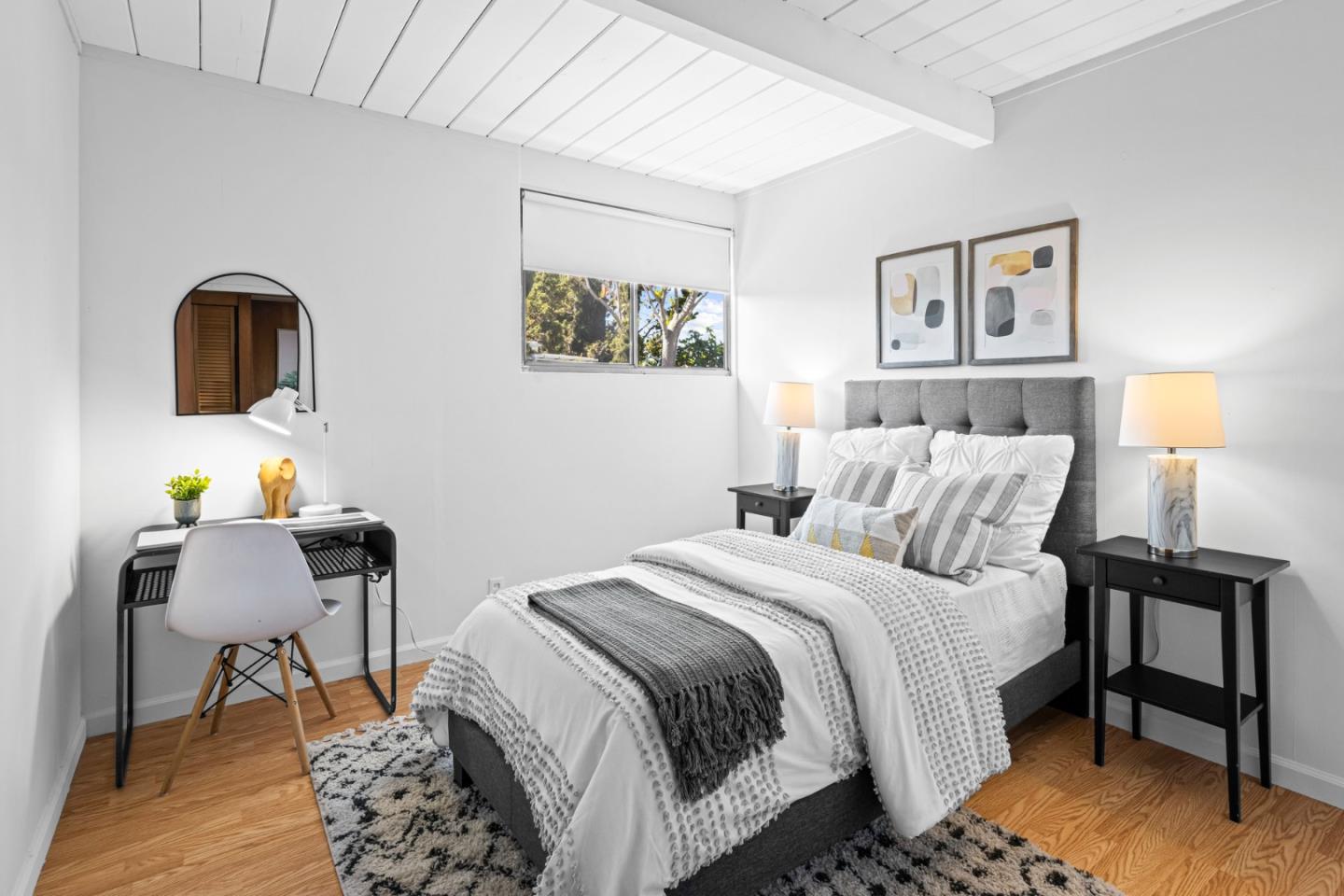 653 Edna Way San Mateo, CA 94402 - Photo 22 of 41 a bedroom with a bed and a chair