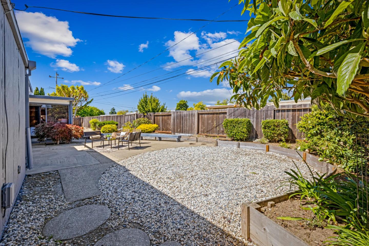 653 Edna Way San Mateo, CA 94402 - Photo 28 of 41 a view of a backyard with a patio