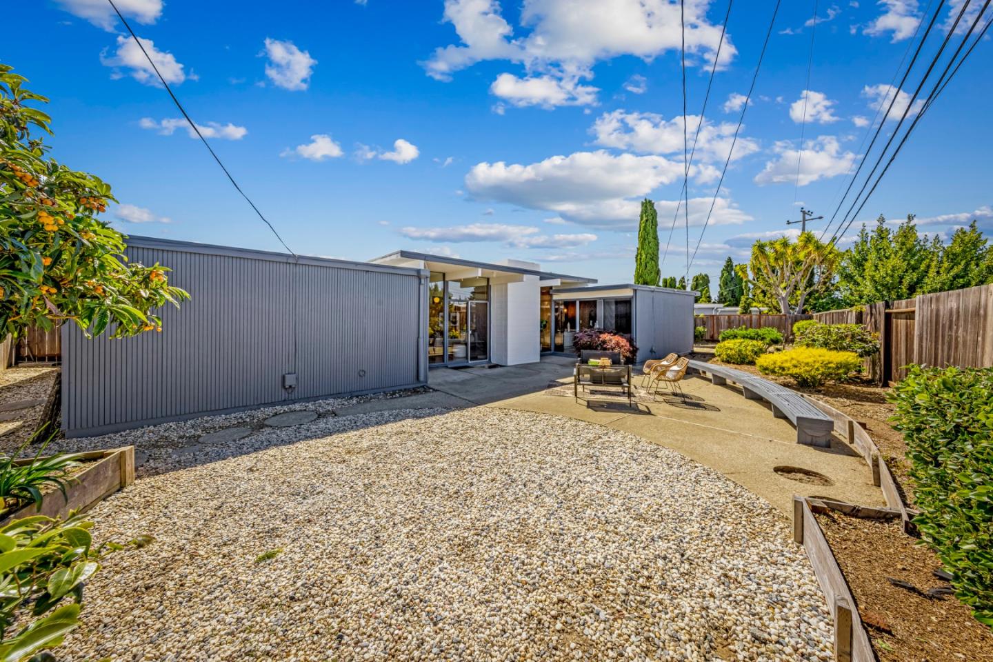 653 Edna Way San Mateo, CA 94402 - Photo 29 of 41 a view of a backyard with sitting area