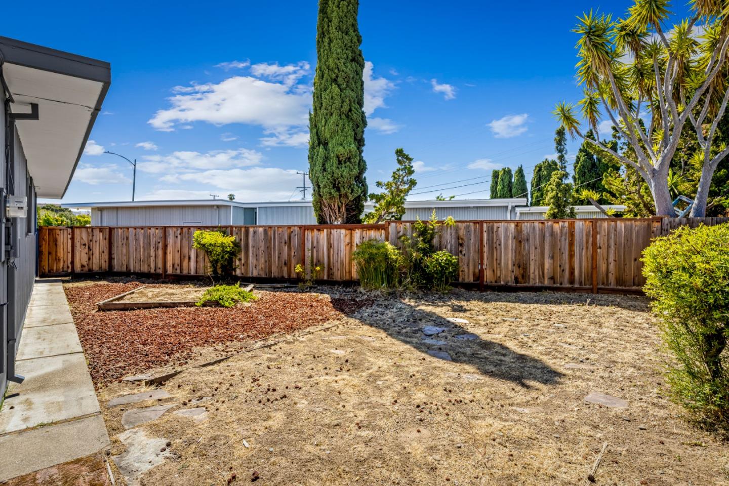 653 Edna Way San Mateo, CA 94402 - Photo 32 of 41 a view of a backyard