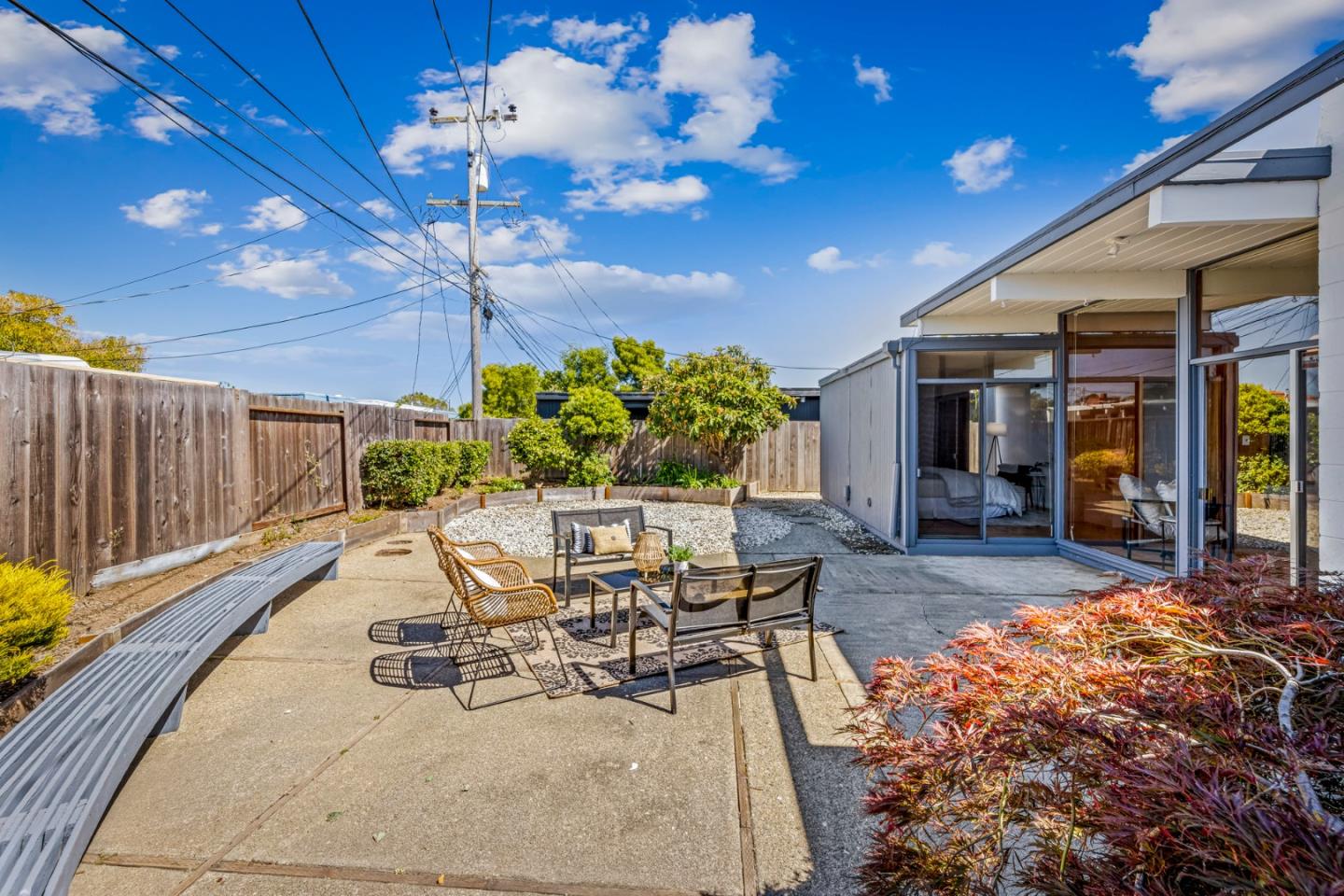 653 Edna Way San Mateo, CA 94402 - Photo 34 of 41 a view of a patio with table and chairs and potted plants