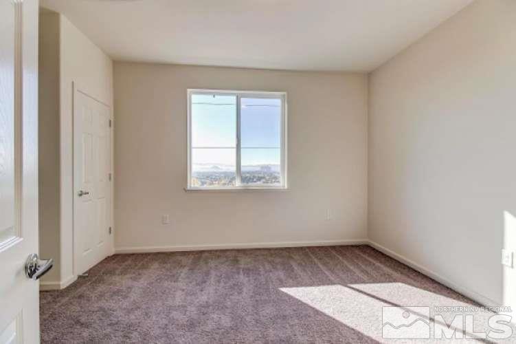 3195 Sterling Ridge Circle Sparks, NV 89431 - Photo 4 of 4 an empty room with a window