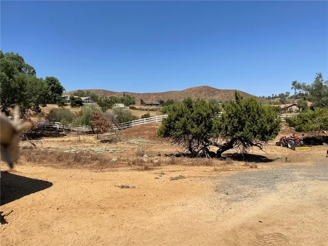 a view of swimming pool with a yard