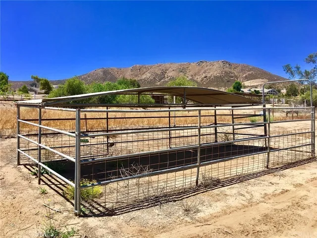 a view of a balcony with a floor to ceiling window