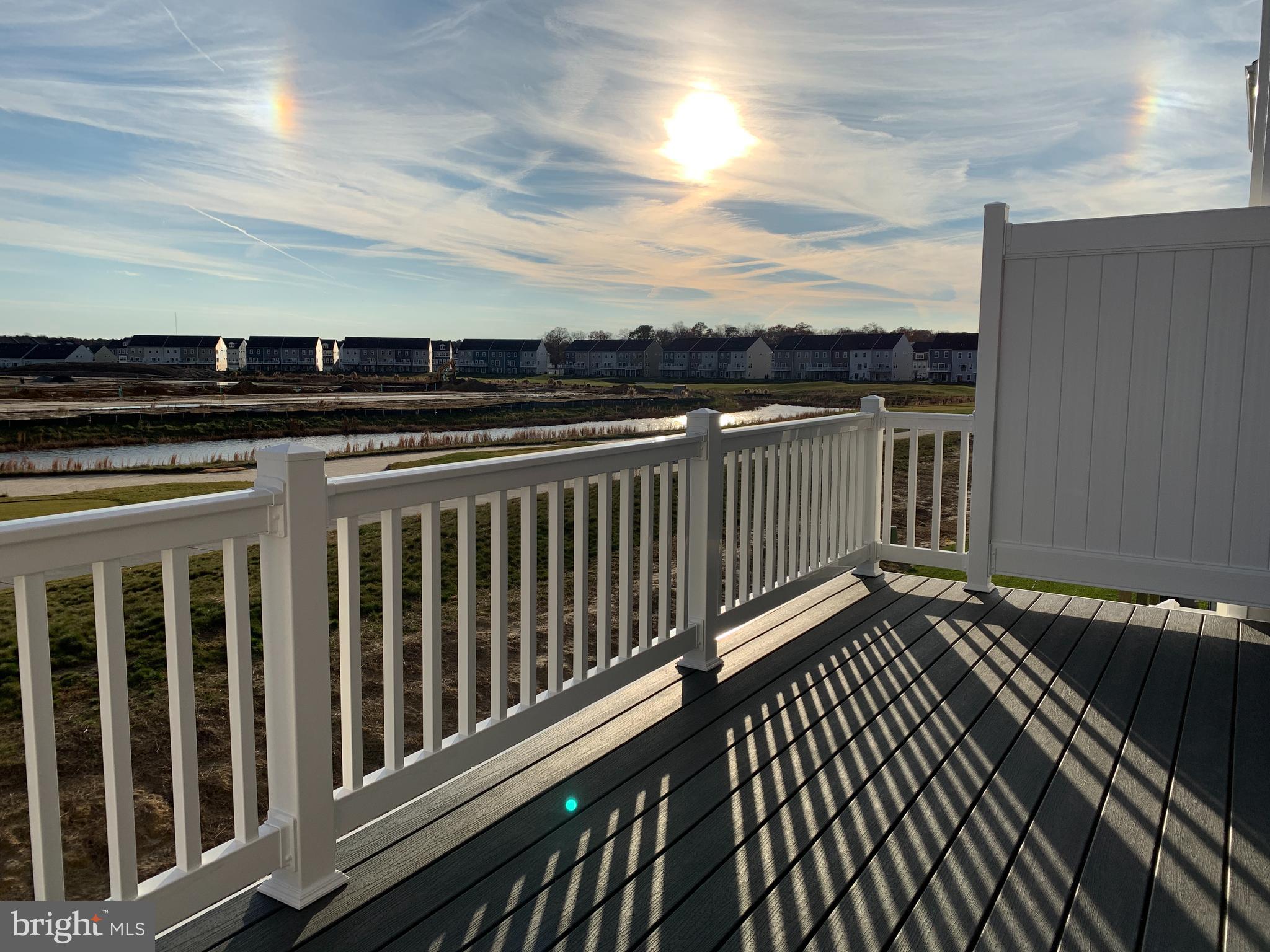 35318 Wright Way Millsboro, DE 19966 - Photo 12 of 28 a view of a balcony with wooden floor