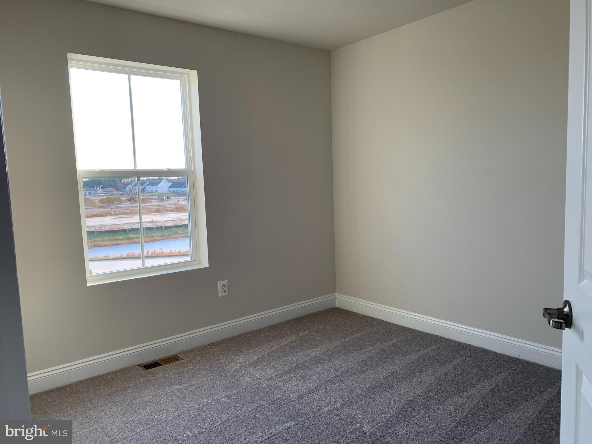 35318 Wright Way Millsboro, DE 19966 - Photo 22 of 28 a room that has a window