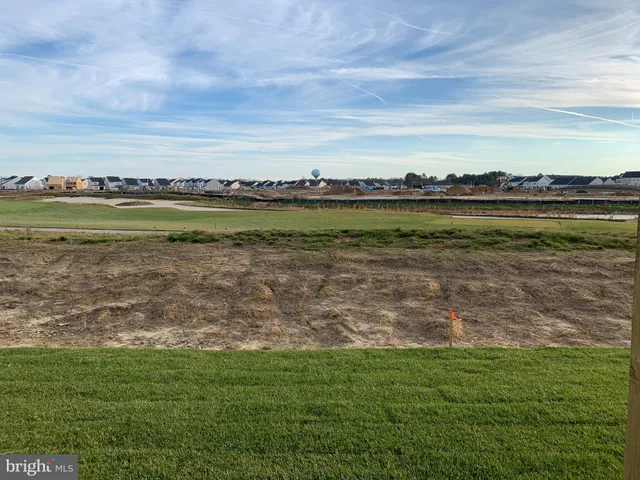 a view of a lake with a city