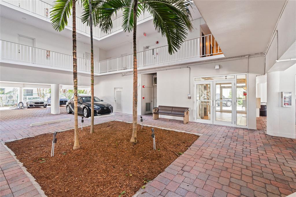 1770 East Las Olas Boulevard, Unit 505 Fort Lauderdale, FL 33301 - Photo 12 of 33 a view of a living room and entry way