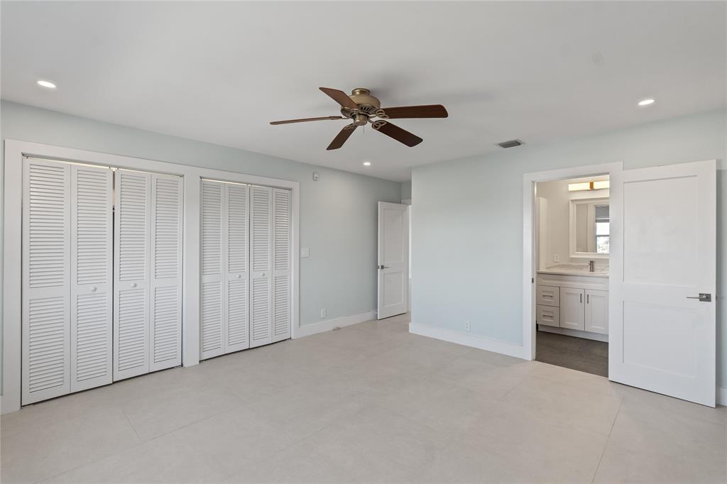 1770 East Las Olas Boulevard, Unit 505 Fort Lauderdale, FL 33301 - Photo 6 of 33 wooden floor in an empty room and a ceiling fan window