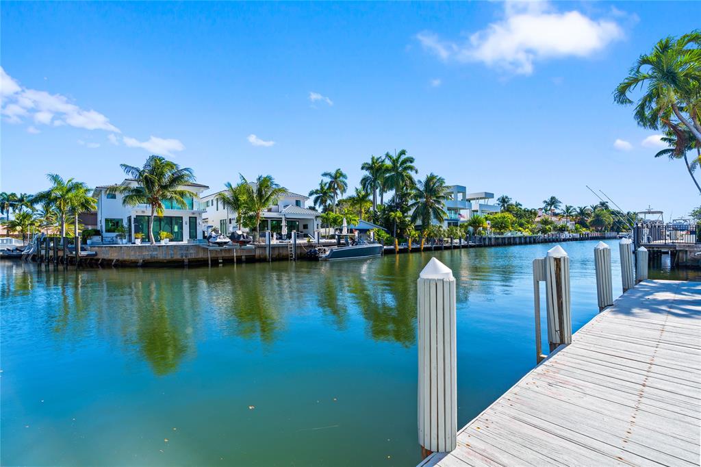1770 East Las Olas Boulevard, Unit 505 Fort Lauderdale, FL 33301 - Photo 9 of 33 a view of a lake with boats and trees in the background