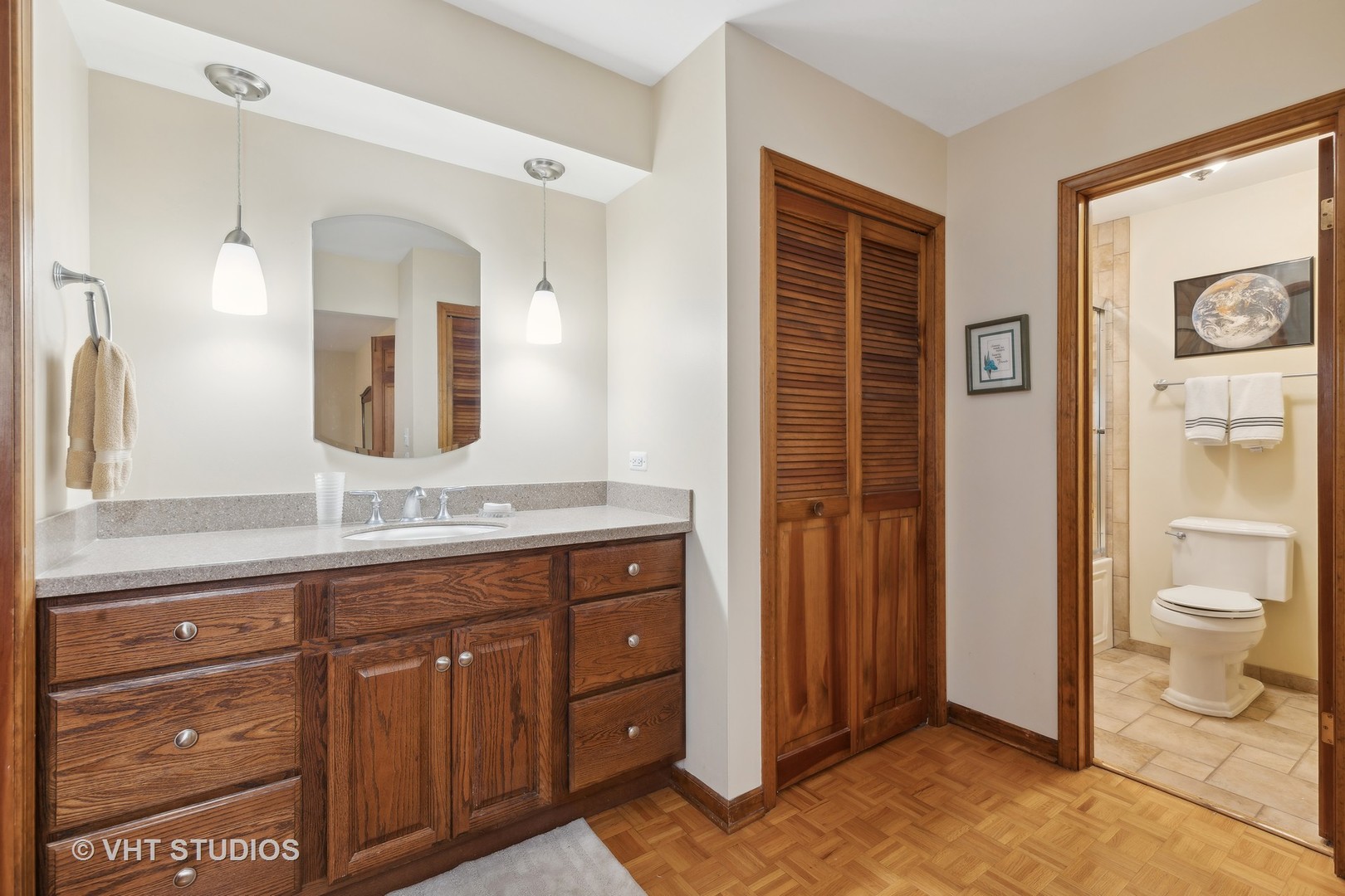2919 Embassy Row Flossmoor, IL 60422 - Photo 12 of 20 a spacious bathroom with a granite countertop toilet sink and a mirror