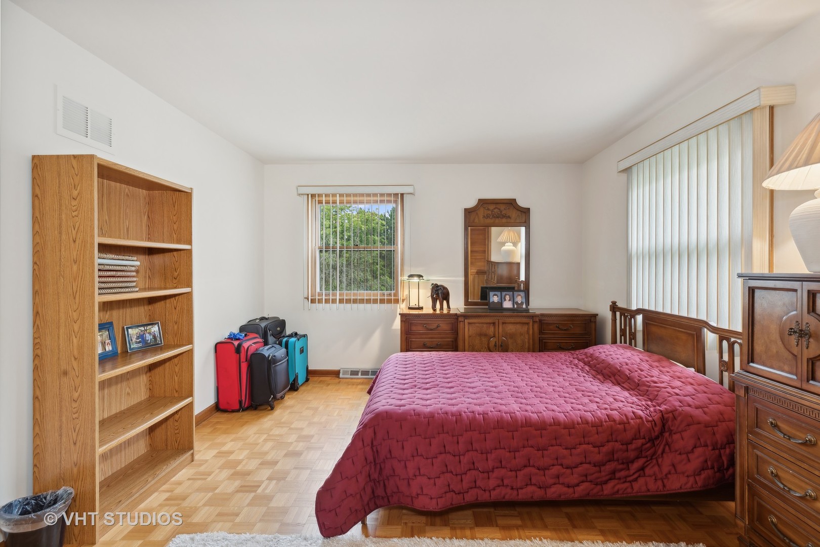 2919 Embassy Row Flossmoor, IL 60422 - Photo 16 of 20 a spacious bedroom with a bed a dresser and a large window
