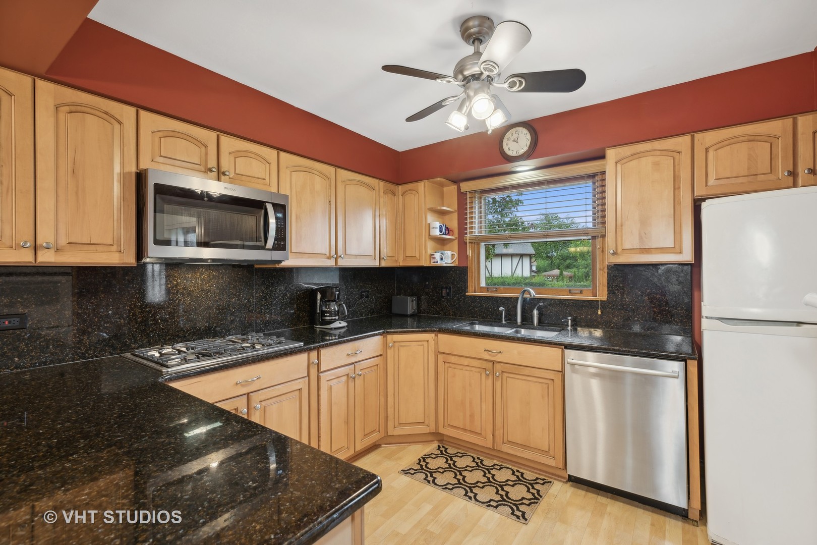 2919 Embassy Row Flossmoor, IL 60422 - Photo 5 of 20 a kitchen with stainless steel appliances granite countertop a sink a microwave and cabinets