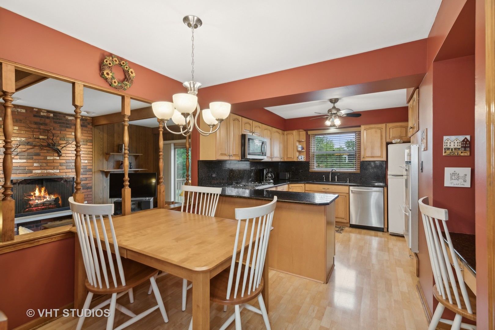 2919 Embassy Row Flossmoor, IL 60422 - Photo 6 of 20 a view of a dining room and livingroom with furniture wooden floor a chandelier