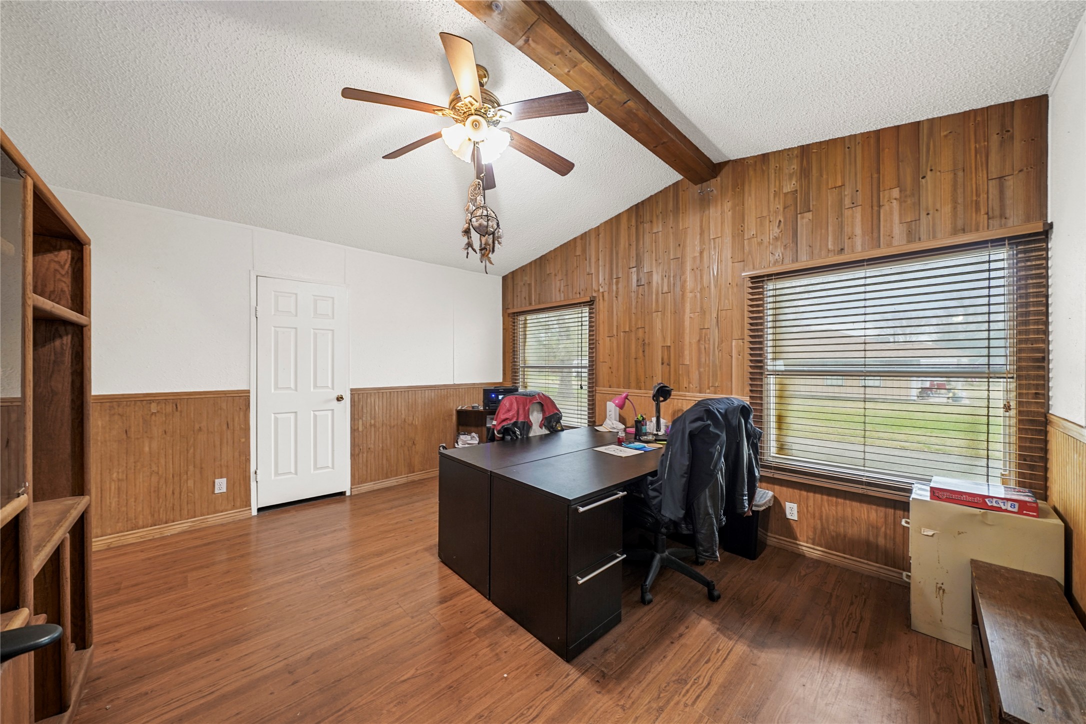19645 Nordt Road Damon, TX 77430 - Photo 16 of 50 a view of a workspace with furniture and a window