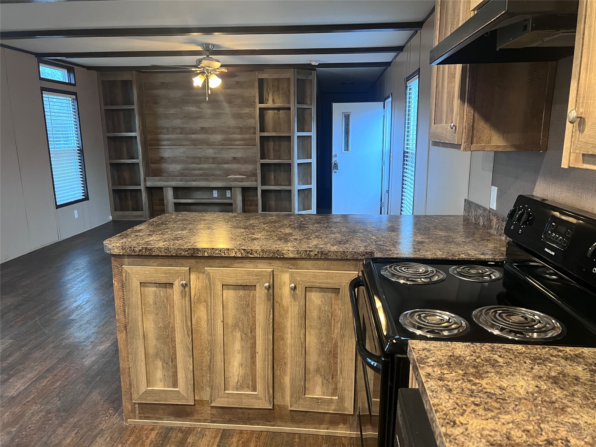 19645 Nordt Road Damon, TX 77430 - Photo 39 of 50 a kitchen with stainless steel appliances granite countertop a stove and a sink