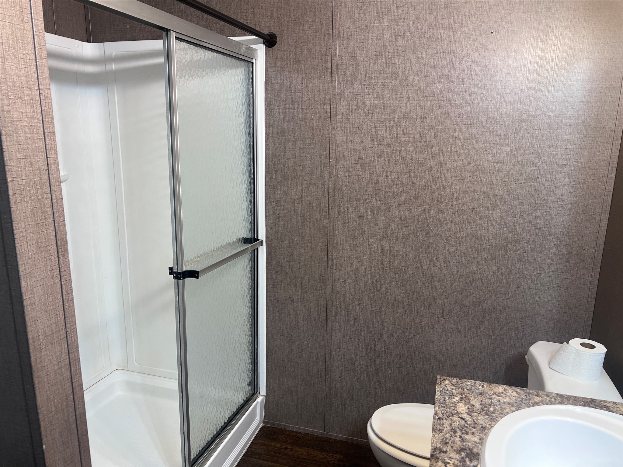 19645 Nordt Road Damon, TX 77430 - Photo 45 of 50 a bathroom with a toilet and a shower