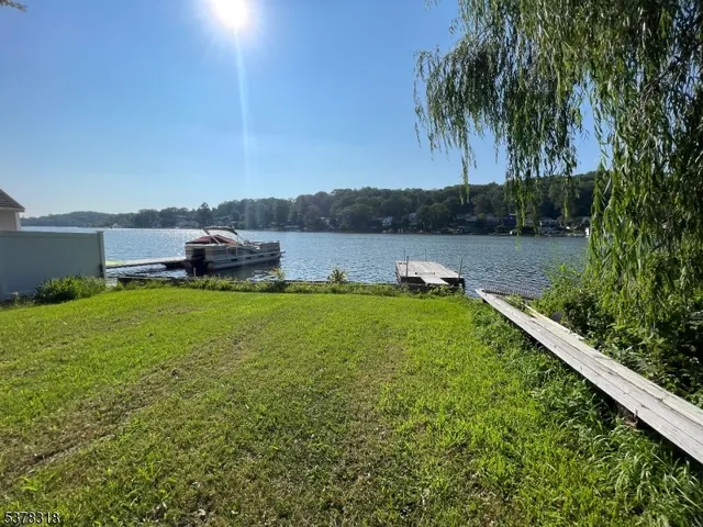 a view of a lake with a big yard