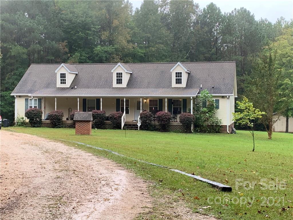 2182 Colvin Road Chester, SC 29706 - Photo 1 of 30 a front view of a house with a yard and trees