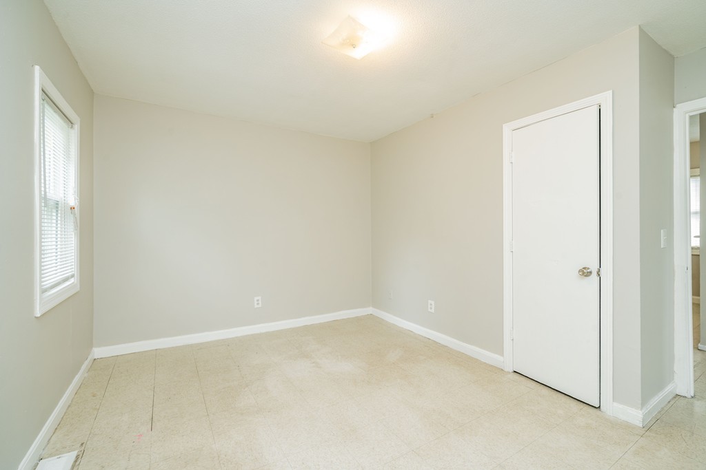 16 Collins Street Springfield, MA 01109 - Photo 11 of 17 an empty room with a window