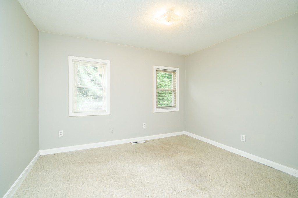 16 Collins Street Springfield, MA 01109 - Photo 14 of 17 an empty room with a window