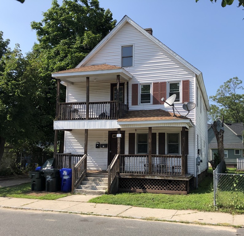 16 Collins Street Springfield, MA 01109 - Photo 2 of 17 a view of small white house with a yard and large window