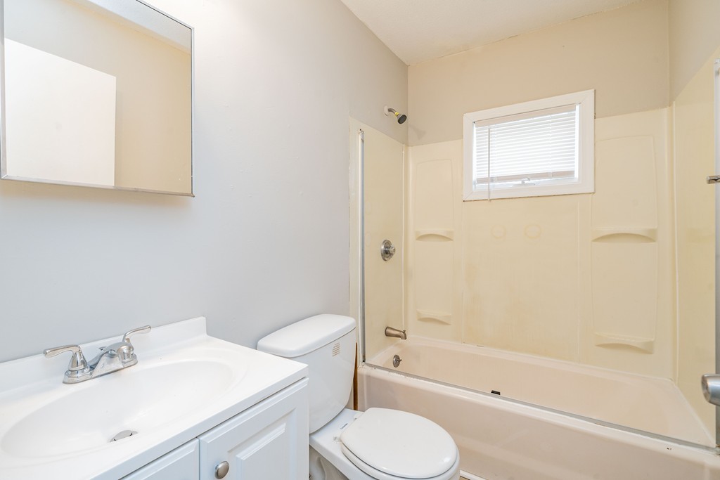 16 Collins Street Springfield, MA 01109 - Photo 8 of 17 a bathroom with a sink toilet and shower