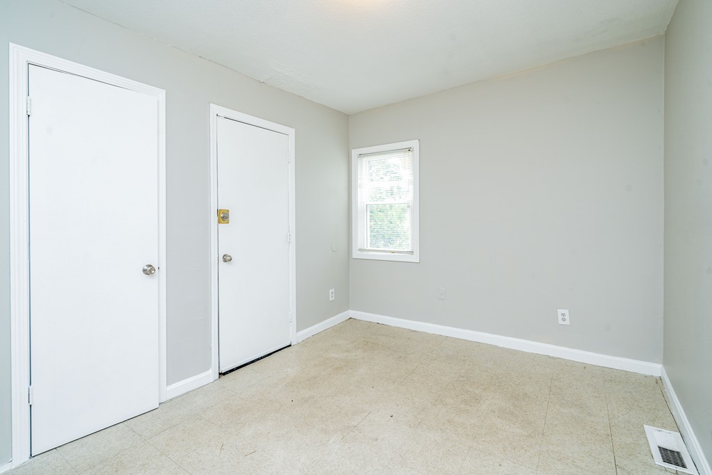 16 Collins Street Springfield, MA 01109 - Photo 9 of 17 an empty room with windows