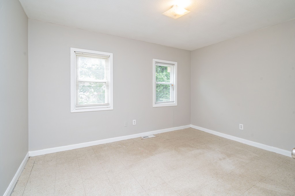 16 Collins Street Springfield, MA 01109 - Photo 10 of 17 an empty room with windows