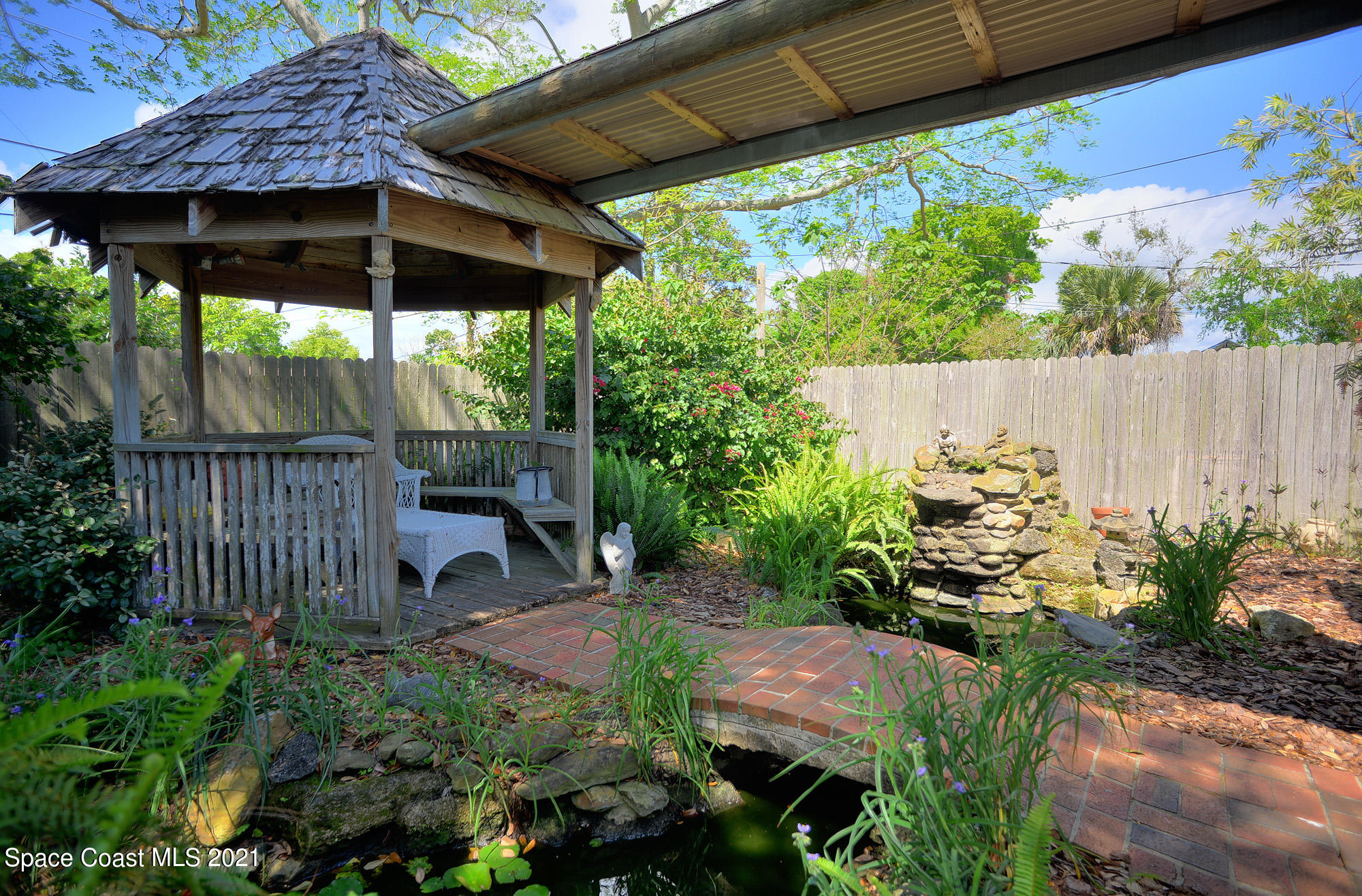 2409 Cherbourg Road Cocoa, FL 32926 - Photo 14 of 21 gazebo pond
