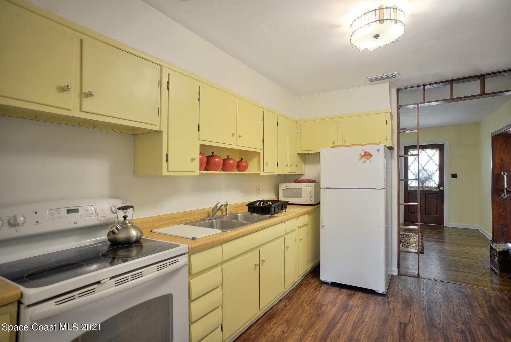 2409 Cherbourg Road Cocoa, FL 32926 - Photo 5 of 21 kitchen 2