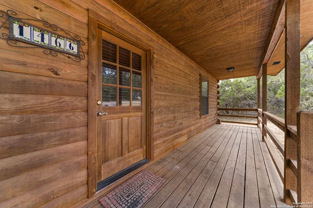 a view of outdoor space with wooden floor
