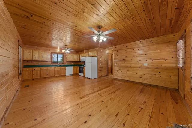 a view of a livingroom with wooden floor