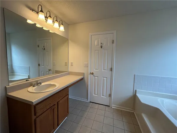 a view of hallway with shower