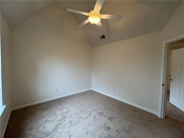 a view of a room with an empty space