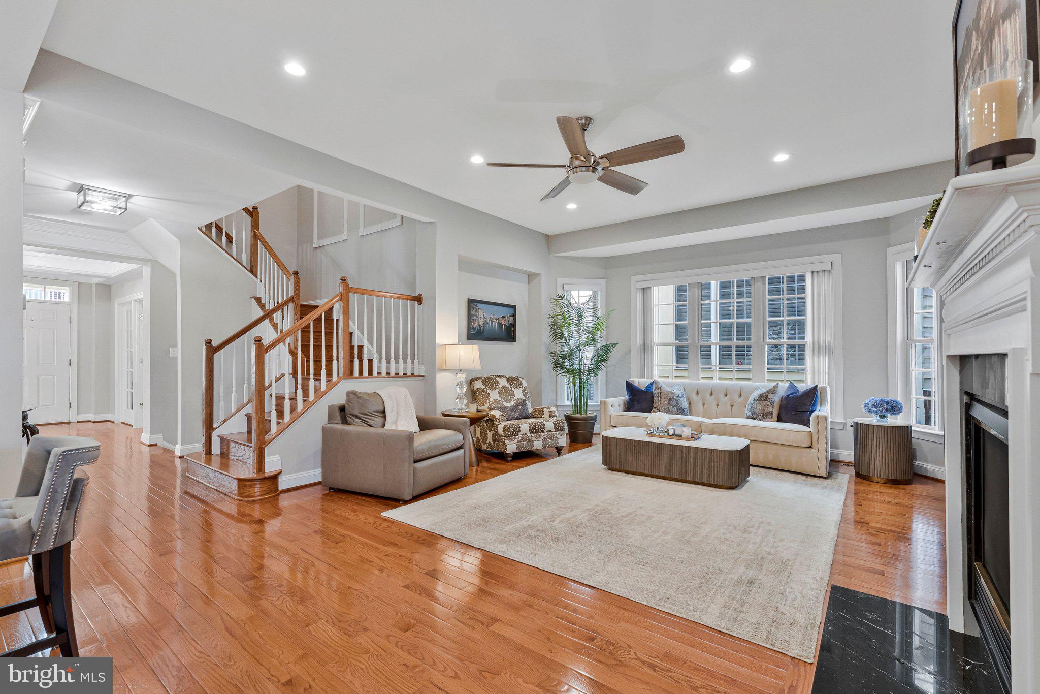 9183 Topaz Street Fairfax, VA 22031 - Photo 19 of 67 a living room with furniture or couch and a wooden floor