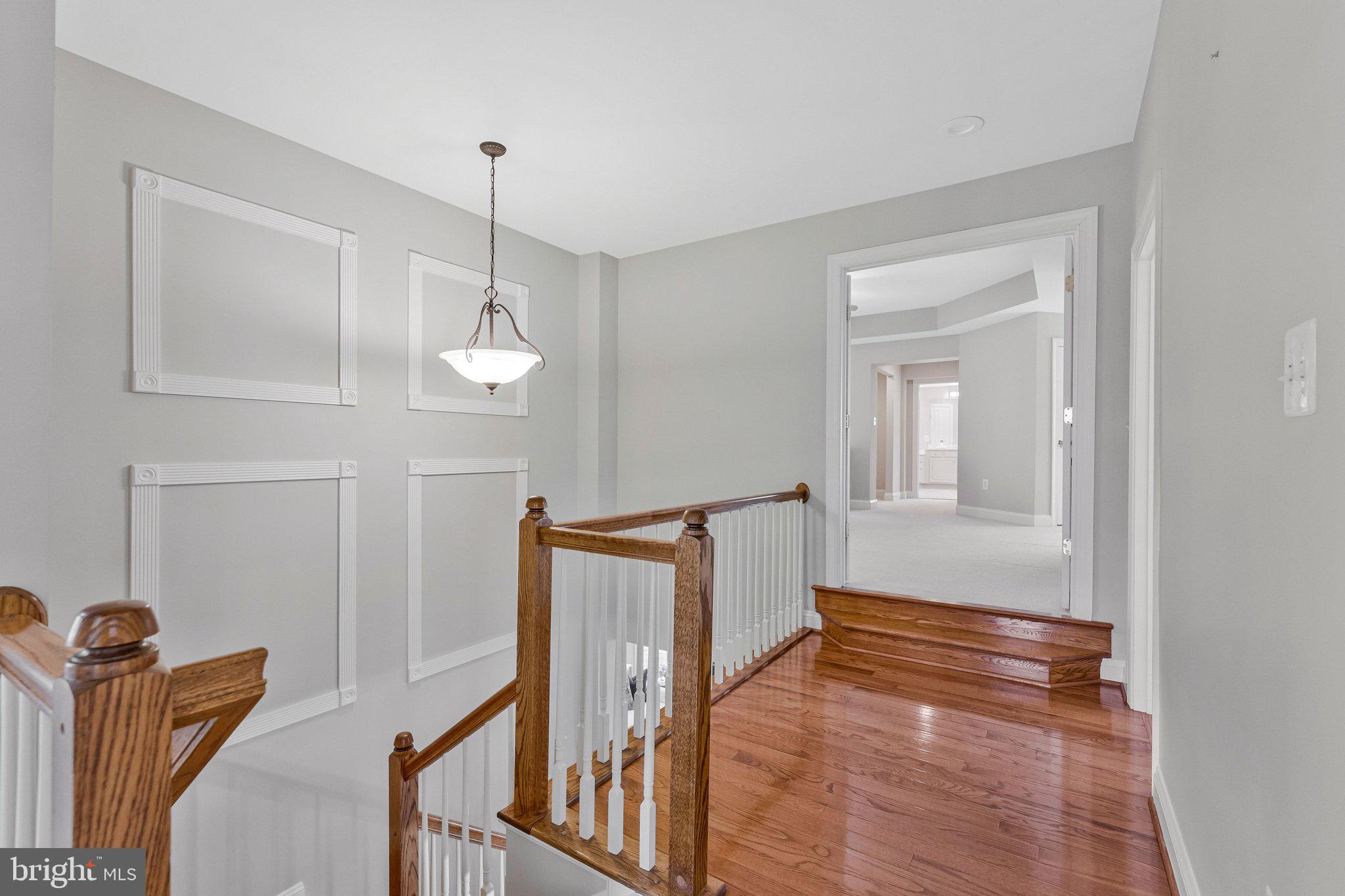 9183 Topaz Street Fairfax, VA 22031 - Photo 28 of 67 a view of a livingroom with wooden floor and stairs