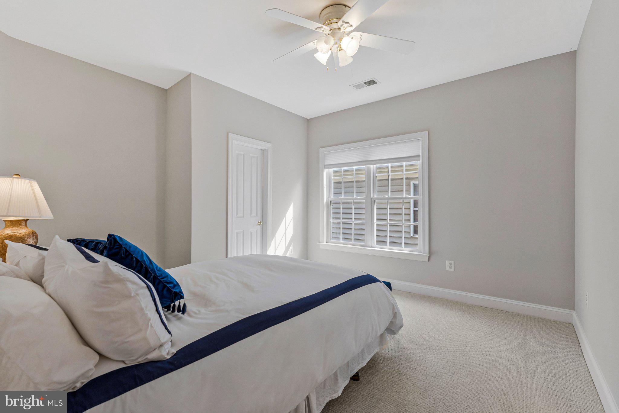 9183 Topaz Street Fairfax, VA 22031 - Photo 39 of 67 a bedroom with a bed and a window