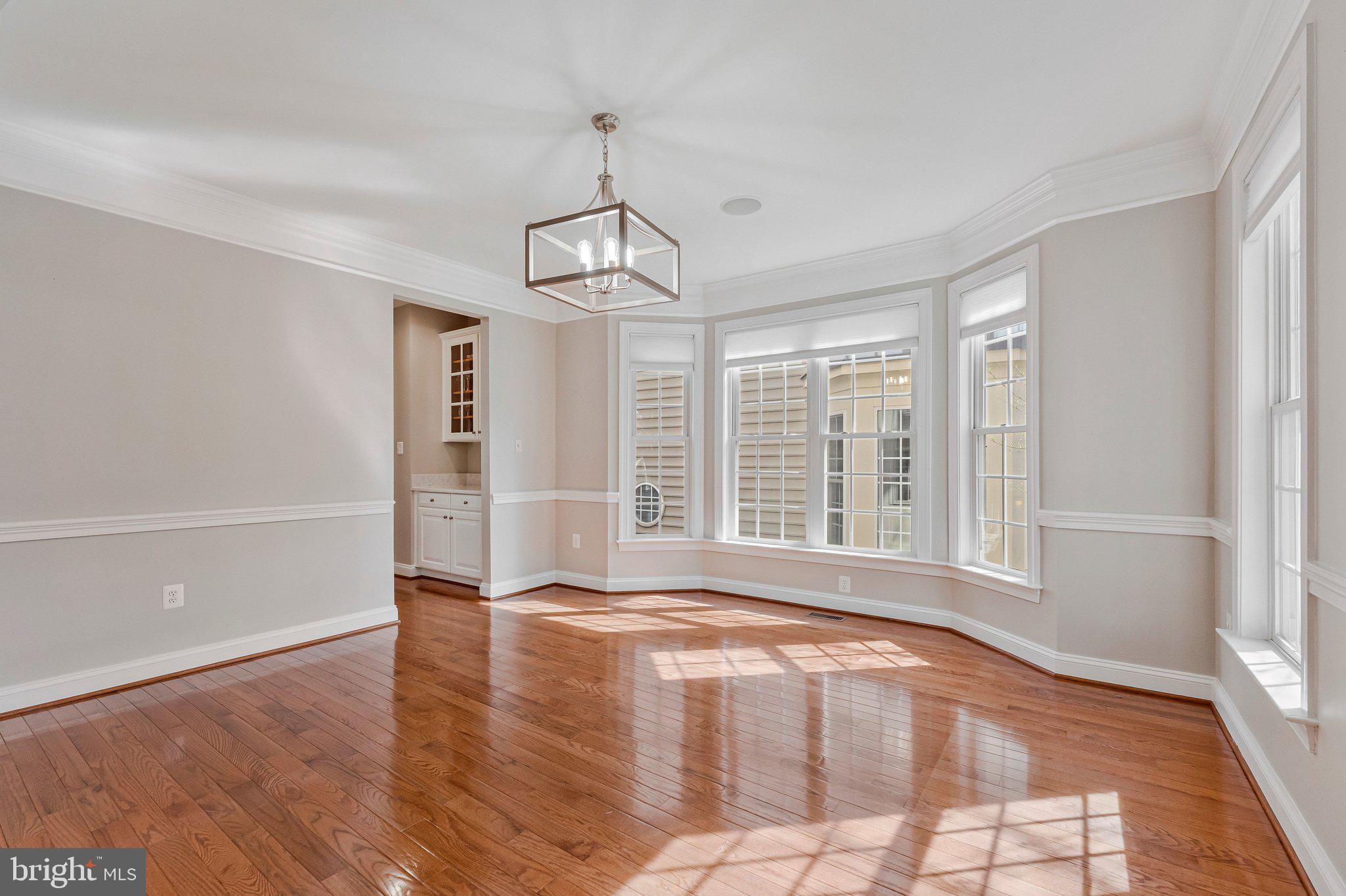 9183 Topaz Street Fairfax, VA 22031 - Photo 6 of 67 a view of livingroom with hardwood floor and window