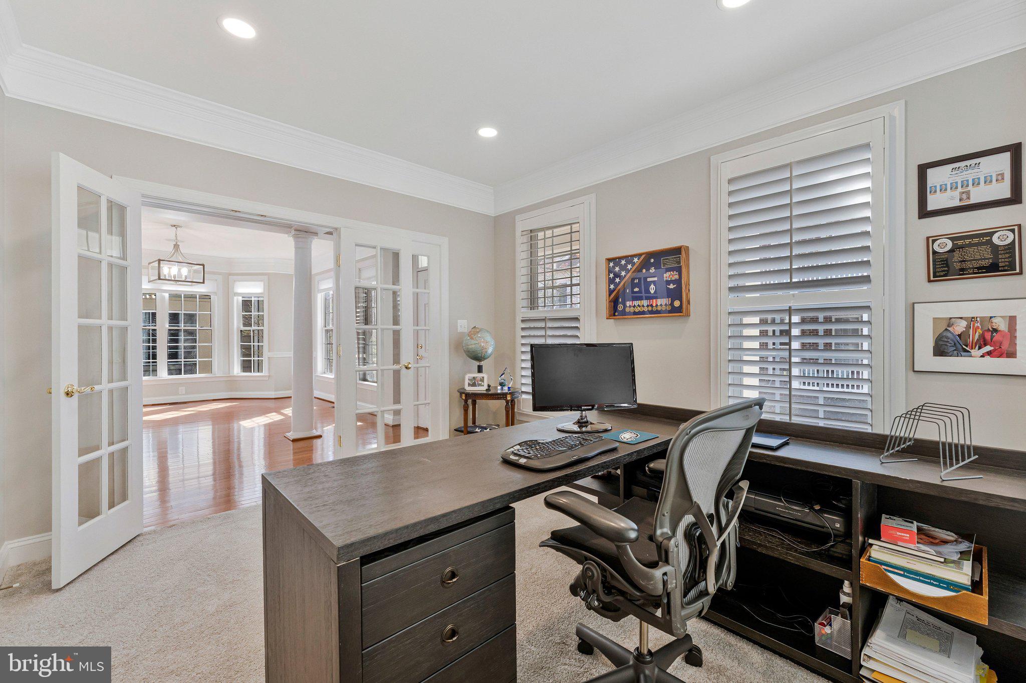 9183 Topaz Street Fairfax, VA 22031 - Photo 10 of 67 a view of a workspace with furniture and a window
