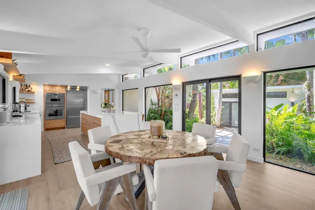 a kitchen that has a sink and a stove