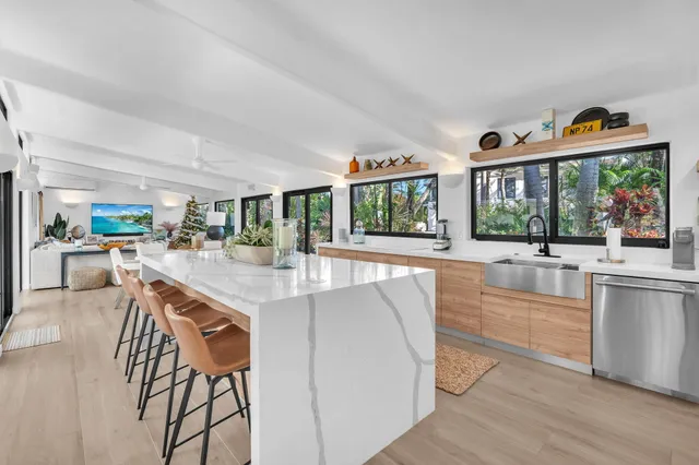 a view of a living room and dining room