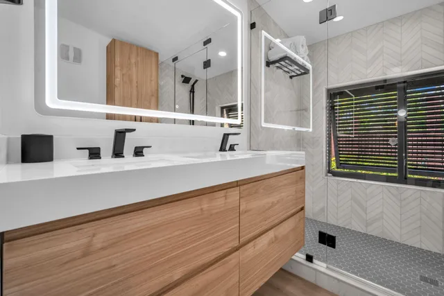 a bedroom with a bed and a chair