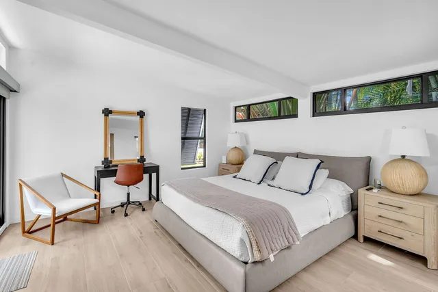 a view of water fountain in the backyard of a house