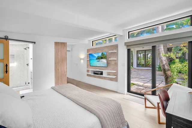 a view of a yard with a palm trees